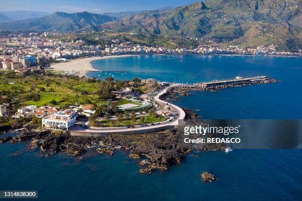 Aerial view of the town and Ionian sea. Giardini Naxos. Messina. Sicily. Italy. Europe.