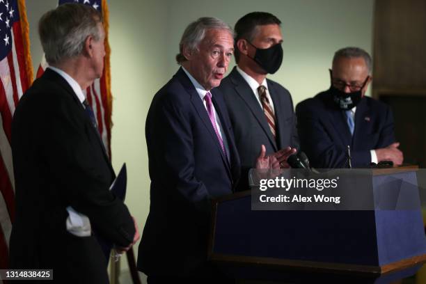 Sen. Ed Markey speaks as Sen. Angus King , Sen. Martin Heinrich and Senate Majority Leader Sen. Chuck Schumer listen during a news briefing after a...