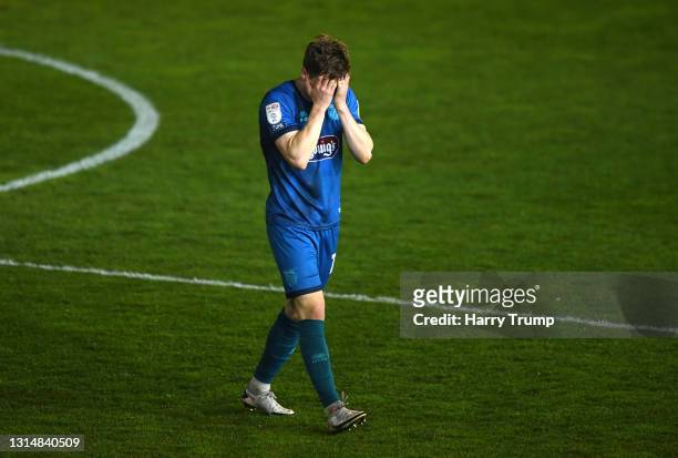 Harry Clifton of Grimsby Town looks dejected as their side is relegated after the Sky Bet League Two match between Exeter City and Grimsby Town at St...