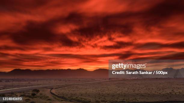 scenic view of dramatic sky during sunset,fujairah,united arab emirates - fujairah stock-fotos und bilder