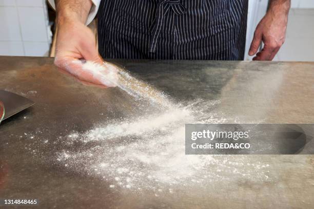 The preparation of a classic Margherita pizza. Italy. Step 01.