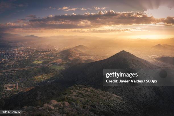 aerial view of landscape against sky during sunset,santiago,chile - santiago chile stock pictures, royalty-free photos & images