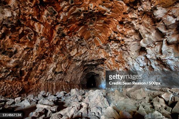 full frame shot of cave,undara volcanic national park,australia - caverne stock pictures, royalty-free photos & images