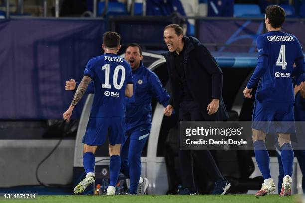 Christian Pulisic of Chelsea FC celebrates with team manager Thomas Tuchel after scoring their team's first goal during the UEFA Champions League...