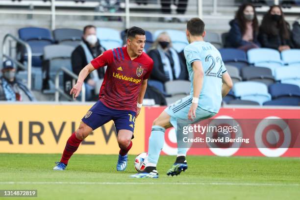 Rubio Rubin of Real Salt Lake dribbles the ball while Jukka Raitala of Minnesota United defends in the first half of the game at Allianz Field on...