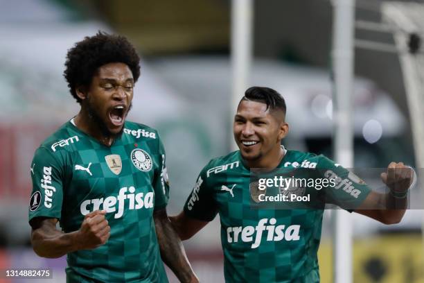 Luiz Adriano of Palmeiras celebrates with teammate Roni of Palmeiras after scoring the second goal of his team during a match between Palmeiras and...