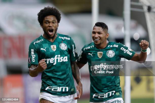 Luiz Adriano of Palmeiras celebrates with teammate Roni of Palmeiras after scoring the second goal of his team during a match between Palmeiras and...