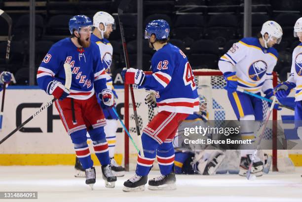 Alexis Lafreniere of the New York Rangers celebrates his goal at 9:49 of the third period against the Buffalo Sabres at Madison Square Garden on...