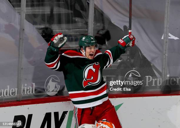 Connor Carrick of the New Jersey Devils celebrates his goal in the third period against the Philadelphia Flyers at Prudential Center on April 27,...