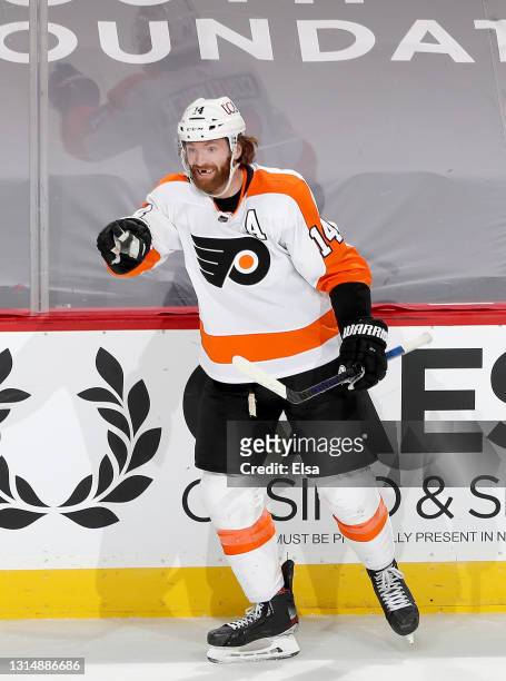 Sean Couturier of the Philadelphia Flyers celebrates his unassisted goal in the third period against the New Jersey Devils at Prudential Center on...
