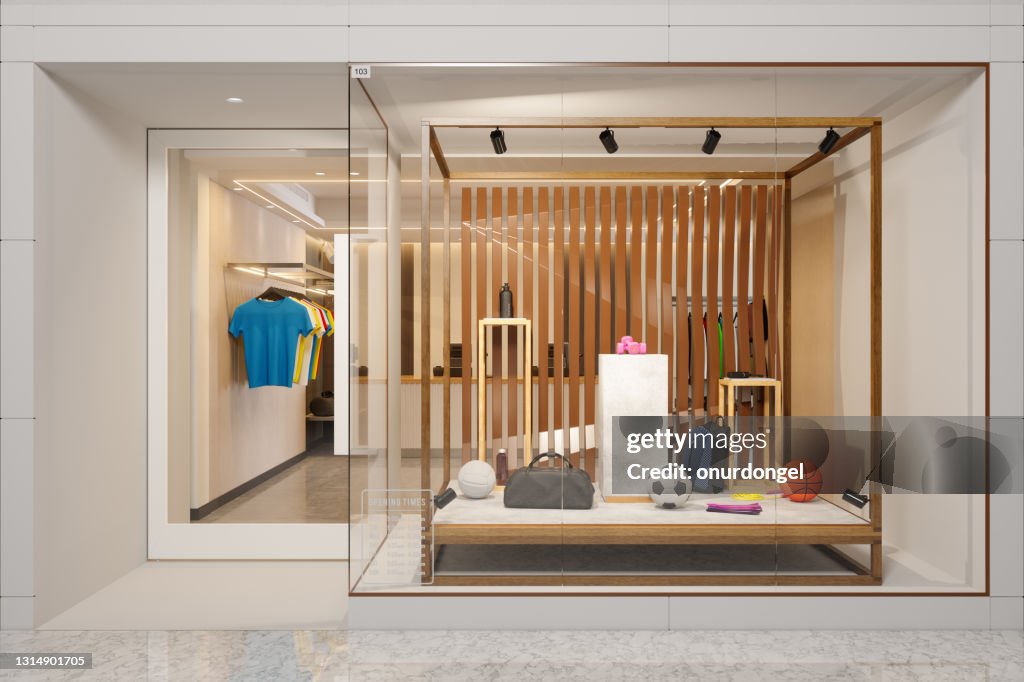 Exterior Of Sports Shop With Sports Balls, Backpacks, And Other Sports Equipments Displaying In Showcase