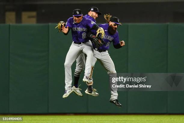 Yonathan Daza of the Colorado Rockies, Garrett Hampson and Charlie Blackmon celebrate beating the San Francisco Giants in extra innings at Oracle...