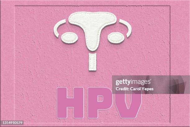 hpv conceptual image in pink background - papilloma stockfoto's en -beelden