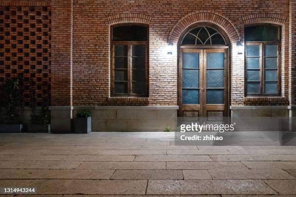 chinese traditional brick buildings and empty streets - chinese window pattern stockfoto's en -beelden