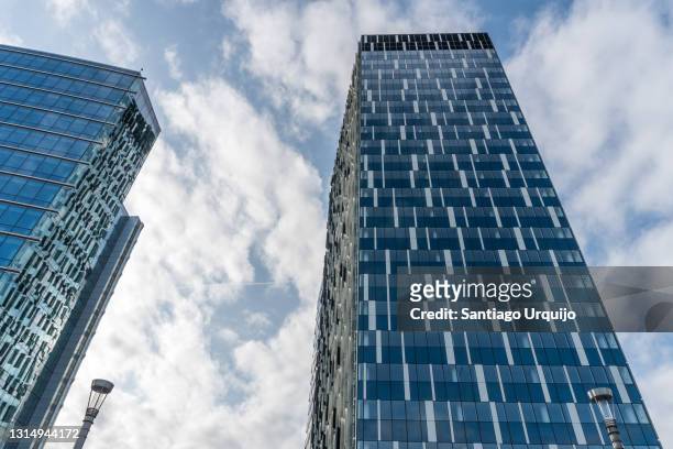the europa building and one tower in brussels - quartier européen bruxelles photos et images de collection