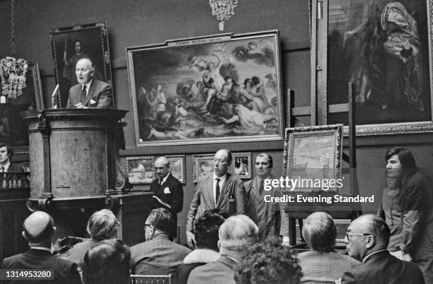 An art auction at Sotheby's auction house in London, UK, April 1971. The painting is Pablo Picasso's 'Mother and Son on the Shore'.