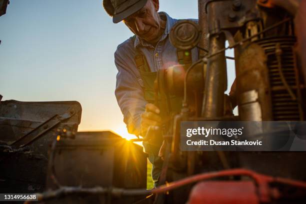 Tractor Engineer 677 Mechanic Working On Tractor Stock Photos, High-Res Pictures, and ...