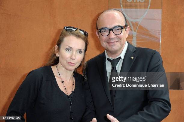 Daisy Derrata and Karl Zero attend the French Open at Roland Garros on May 31, 2011 in Paris, France.