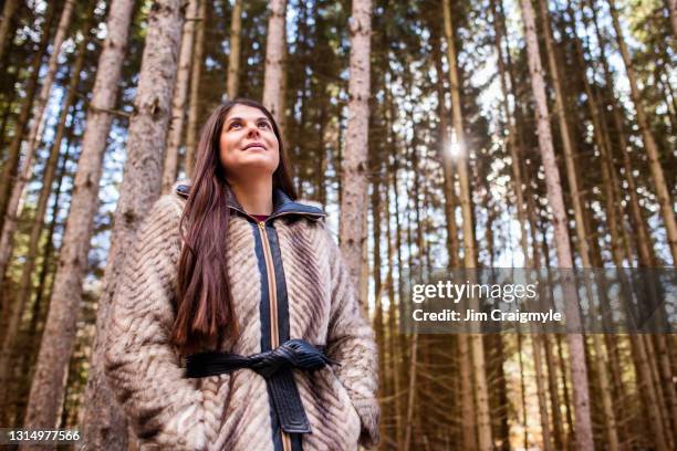 métis woman in a forest - métis stock pictures, royalty-free photos & images