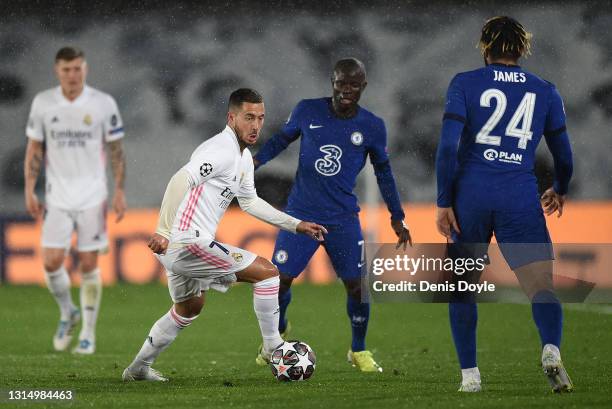 Eden Hazard of Real Madrid controls the ball towards Reece James of Chelsea FC during the UEFA Champions League Semi Final First Leg match between...