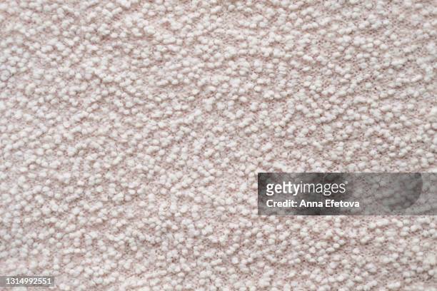 texture of a pastel pink fabric with white soft pellets. flat lay style, close-up. - 粒 ストックフォトと画像