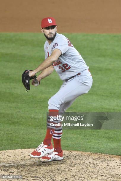 Daniel Ponce de Leon of the St. Louis Cardinals pitches during a baseball game against the Washington Nationals at Nationals Park on April 19, 2021...