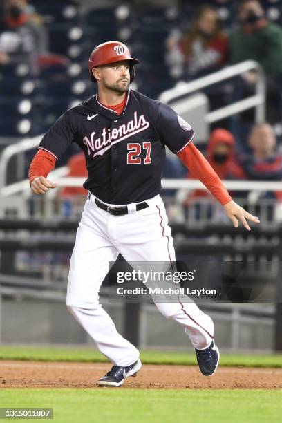 Jordy Mercer of the Washington Nationals leads off first base during a baseball game against the St. Louis Cardinals at Nationals Park on April 19,...