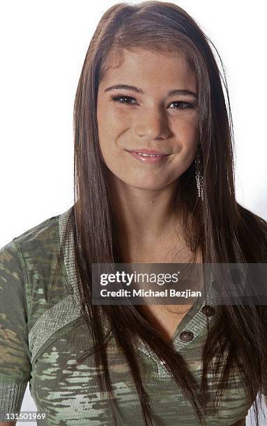 Actress Katelyn Pippy poses at The PhotoFund Portraits for charity for the YUM-O Organization on October 21, 2010 in Los Angeles, California.