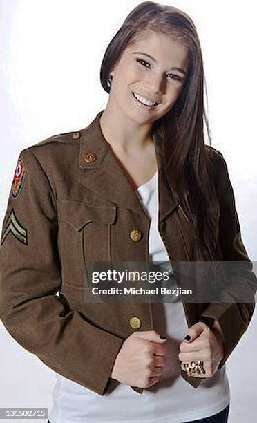 Actress Katelyn Pippy poses at The PhotoFund Portraits for charity for the YUM-O Organization on October 21, 2010 in Los Angeles, California.