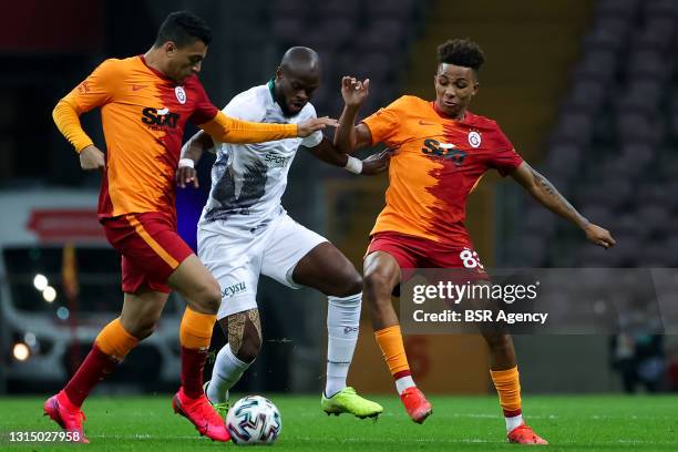 Mostafa Mohamed of Galatasaray, Ismael Diomande of Konyaspor and Gedson Fernandes of Galatasaray during the Super Lig match between Galatasaray SK...