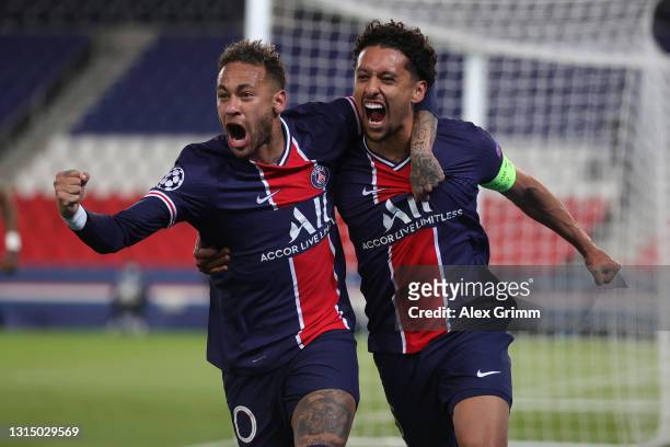 Marquinhos of Paris Saint-Germain celebrates with Neymar after scoring their side's first goal during the UEFA Champions League Semi Final First Leg...