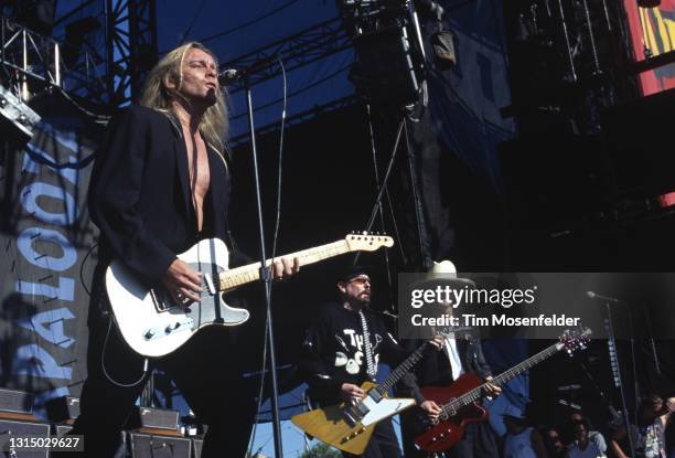 Robin Zander, Rick Neilsen, and Tom Petersson of Cheap Trick perform during Lollapalooza at Winnebago County Fairgrounds on June 30, 1996 in...