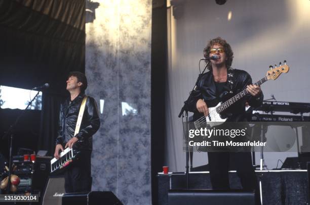 Robert Lamm and Jason Scheff of Chicago perform at Shoreline Amphitheatre on July 10, 1996 in Mountain View, California.