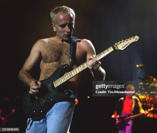 Phil Collen of Def Leppard performs at Shoreline Amphitheatre on August 31, 1996 in Mountain View, California.