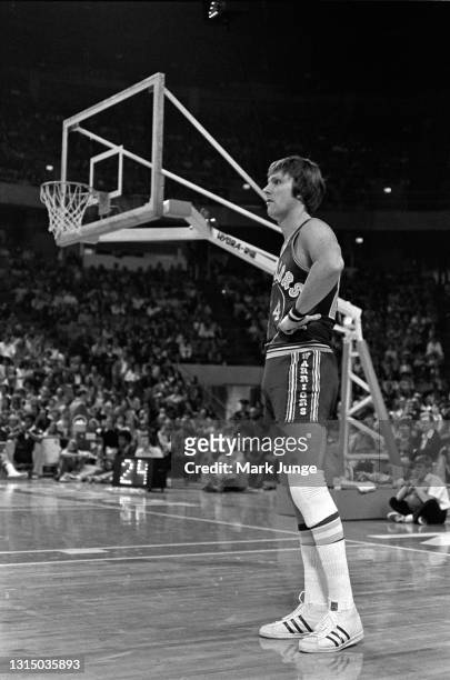 Golden State Warriors forward Rick Barry stands in the corner of the court during an NBA basketball game against the Denver Nuggets at McNichols...