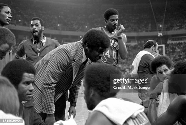 Golden State Warriors head coach Al Attles talks to his team in a timeout during an NBA basketball game against the Denver Nuggets at McNichols Arena...