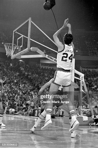 Denver Nuggets forward Bobby Jones shoots a jumper from the corner during an NBA basketball game against the Golden State Warriors at McNichols Arena...