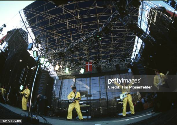 Gerald Casale, Mark Mothersbuagh, Bob Mothersbaugh, and Bob Casale of Devo perform during Lollapalooza at Spartan Stadium on August 2, 1996 in San...