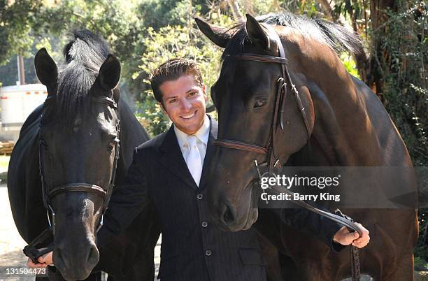 Elite Equestrian Rider Nick Haness poses with horses Ned and Southern during a photo shoot on July 5, 2010 in Silverado, California.