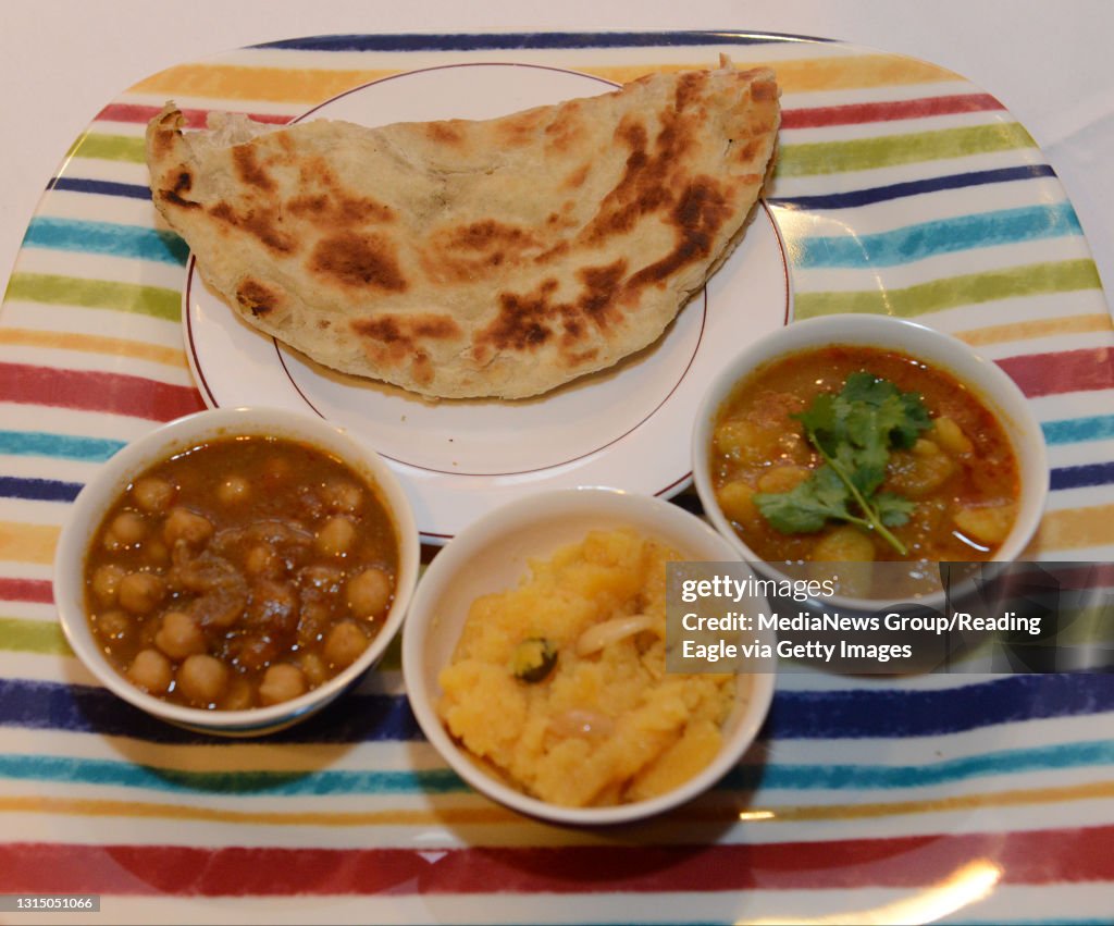 Aashiyana Fine Indian Cuisine restaurant on S. 4th. is back under original ownership and introducing authentic Indian breakfasts. breakfast combo #1 which consists of, Chana Masala, Aloo Bhaji, Sooji Halva, and Lacha Paratha. 4/2/14 photo by Tim Leedy.