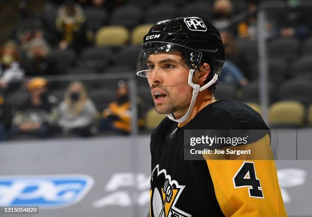 Cody Ceci of the Pittsburgh Penguins skates against the Boston Bruins at PPG PAINTS Arena on April 27, 2021 in Pittsburgh, Pennsylvania.