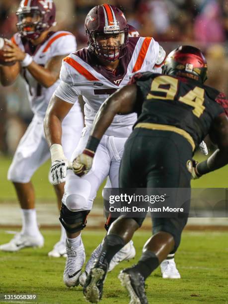 Tackle Christian Darrisaw of the Virginia Tech Hokies during the game against the Florida State Seminoles at Doak Campbell Stadium on Bobby Bowden...