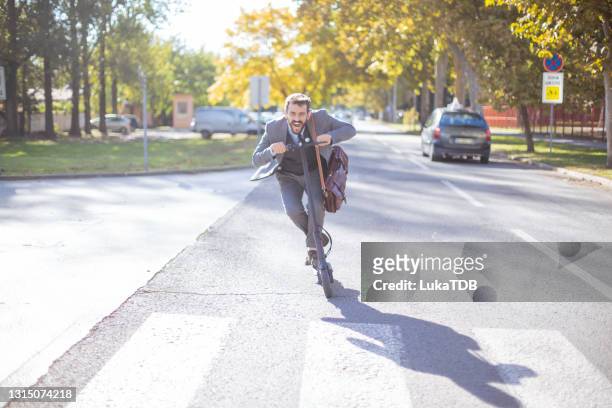 enjoying the morning sun - electric push scooter stock pictures, royalty-free photos & images