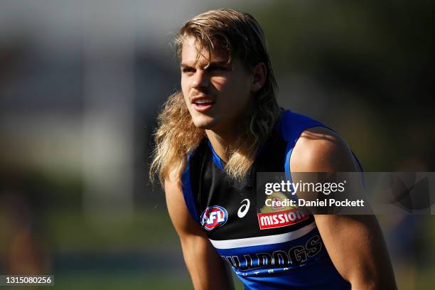 Bailey Smith of the Bulldogs looks on during a Western Bulldogs AFL training session at Whitten Oval on April 29, 2021 in Melbourne, Australia.