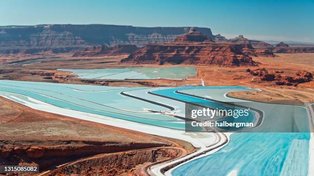 blue potash evaporation ponds in moab, utah - aerial - moab stock pictures, royalty-free photos & images