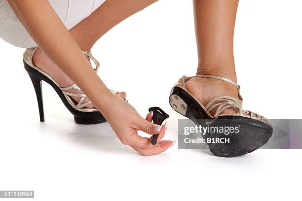 broken heels - high heels stock pictures, royalty-free photos & images