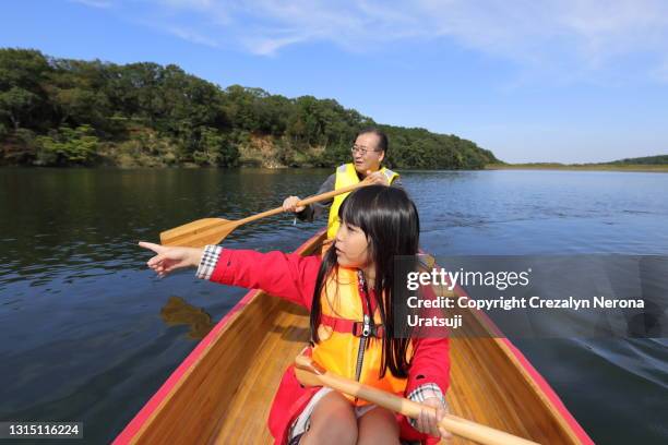 father canoeing with his daughter - 父の日　日本 ストックフォトと画像