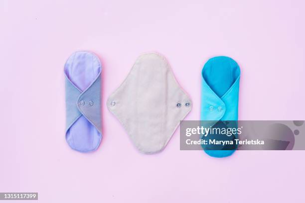 eco textile female pads for menstruation. - cup sizes stock pictures, royalty-free photos & images