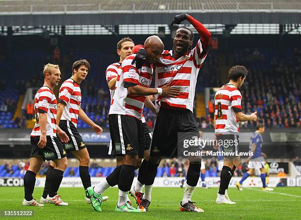 El-Hadji Diouf of Doncaster celebrates his goal with Pascal Chimbonda during the npower Championship match between Ipswich Town and Doncaster Rovers...