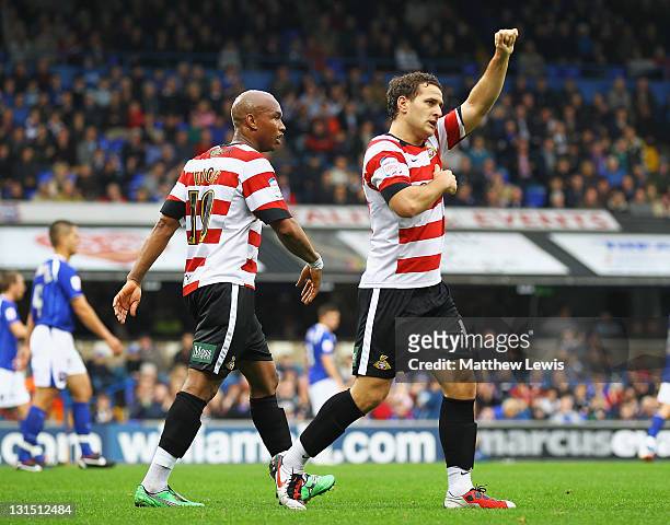 Billy Sharp of Doncaster celebrates his goal with El-Hadji Diouf during the npower Championship match between Ipswich Town and Doncaster Rovers at...